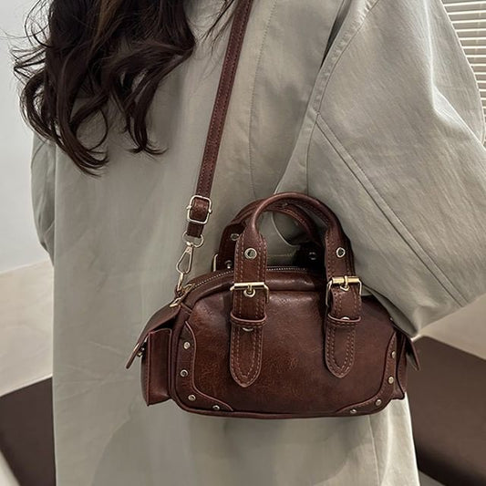 Studded Buckled Flap Pocket Crossbody Bowler Bag