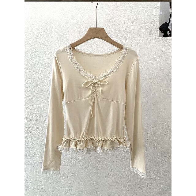 Long-Sleeve Tie-Front Top with Lace Accents and V-Neckline