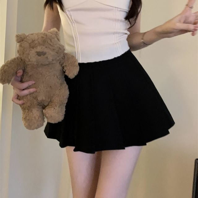 Ruffle-Trim Sleeveless Top with Pleated Mini Skirt