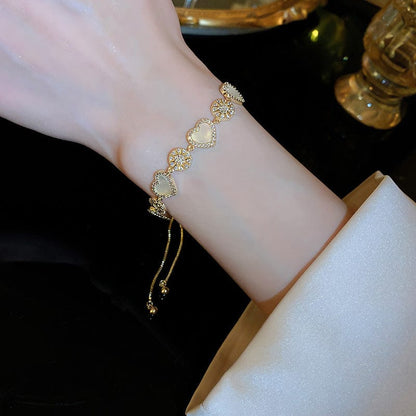 Herz-Armband aus Naturperlen in Gold