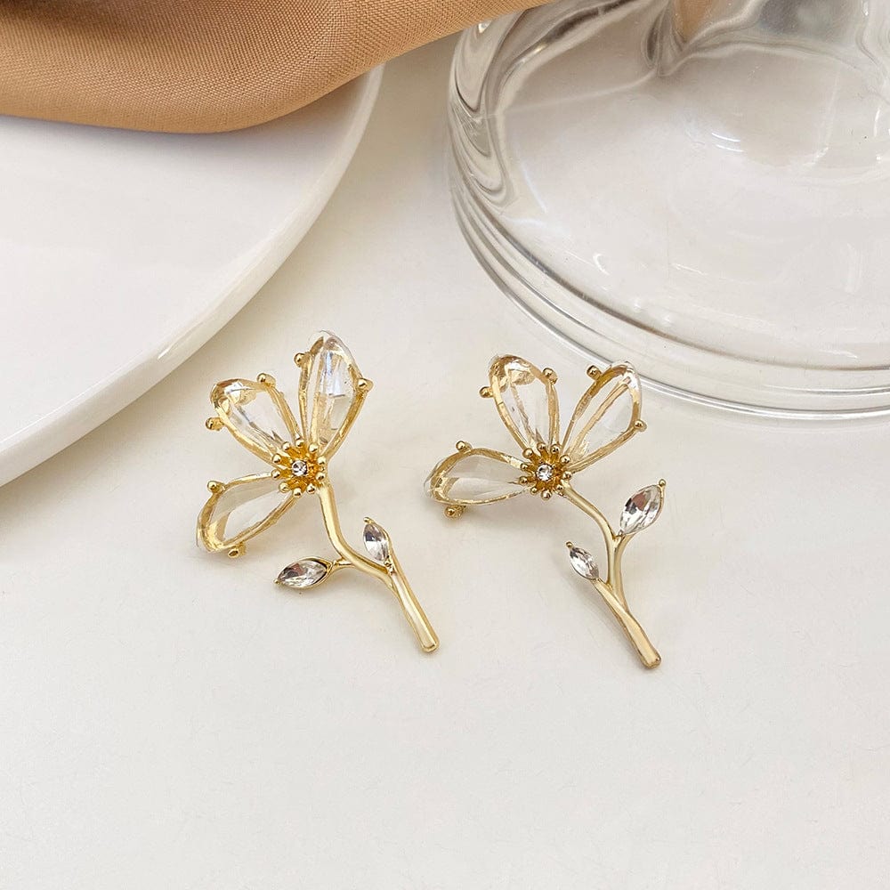 Boucles d'oreilles pendantes chics à motif floral en cristal