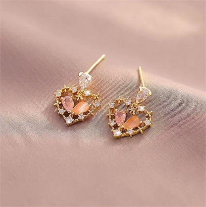 Boucles d'oreilles charmantes en forme de cœur creux et floral en cristal