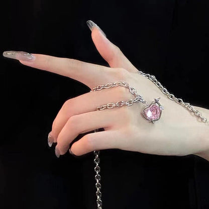 Collier chaîne à maillons avec pendentif en forme de cœur en strass rose