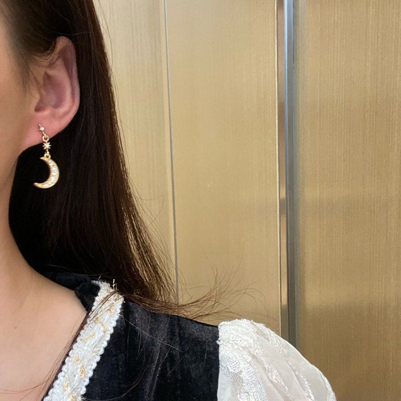 Boucles d'oreilles pendantes chics en forme de lune et d'étoile à strass