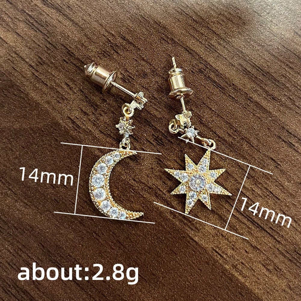 Boucles d'oreilles pendantes chics en forme de lune et d'étoile à strass