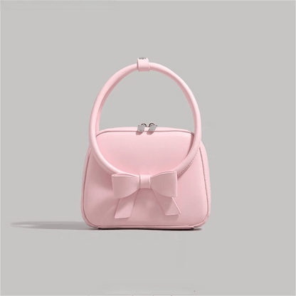 Sac à bandoulière en cuir avec nœud papillon rose