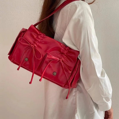 Sac à bandoulière en cuir avec ruban coloré