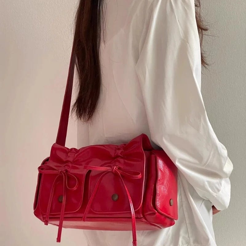 Sac à bandoulière en cuir avec ruban coloré