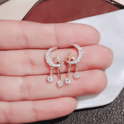 Boucles d'oreilles pendantes élégantes en forme d'étoile et de lune