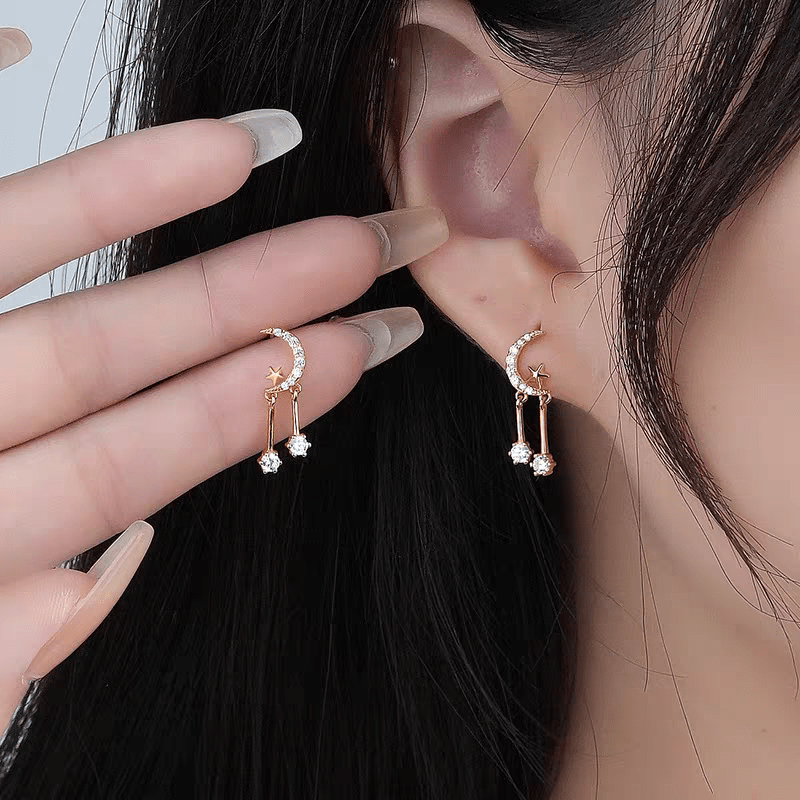 Boucles d'oreilles pendantes élégantes en forme d'étoile et de lune