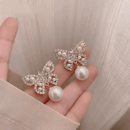 Boucles d'oreilles papillon en perles