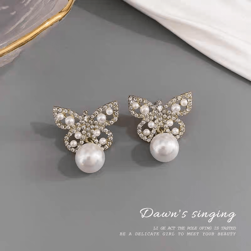 Boucles d'oreilles papillon en perles