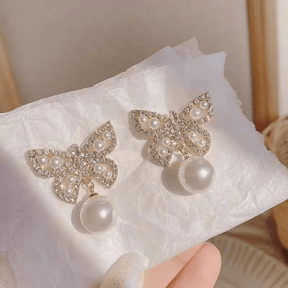 Boucles d'oreilles papillon en perles