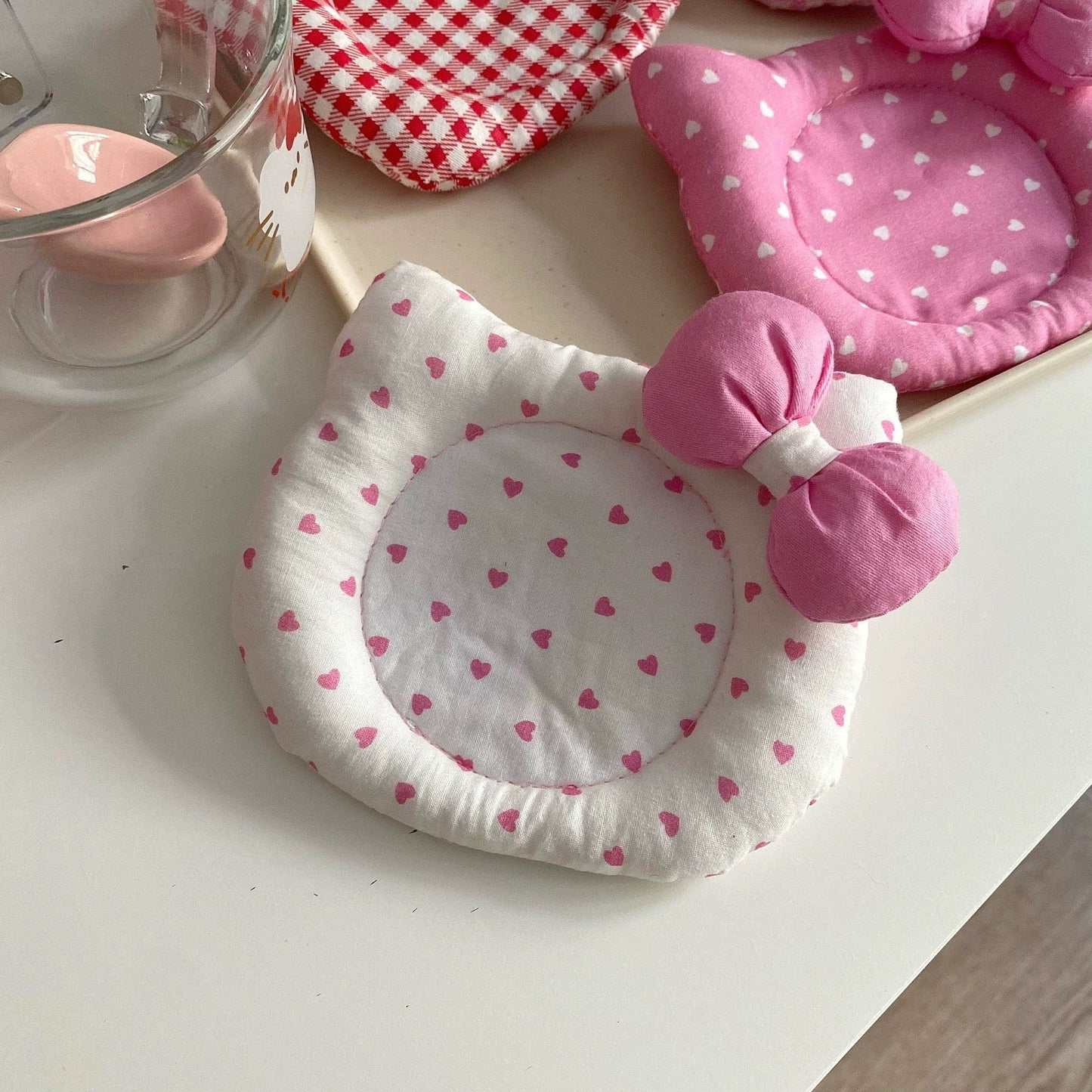 Dessous de verre en tissu en forme de chaton mignon