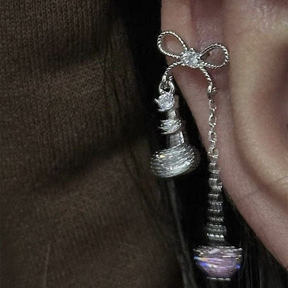 Boucles d'oreilles chics en forme de cœur avec nœud papillon et chaîne à pampilles