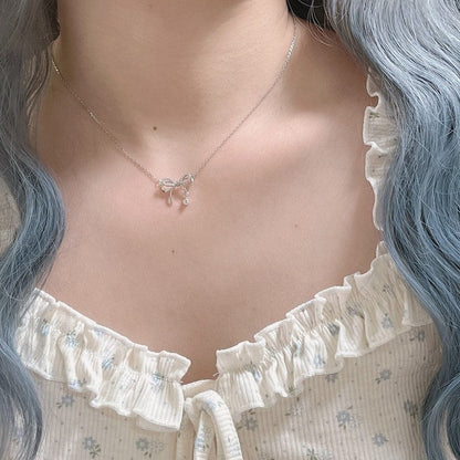 Collier à breloques élégant avec nœud papillon Kawaii