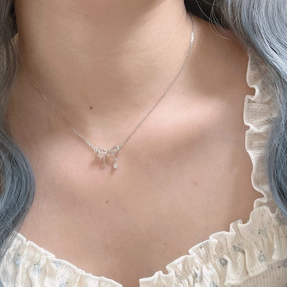 Collier à breloques élégant avec nœud papillon Kawaii