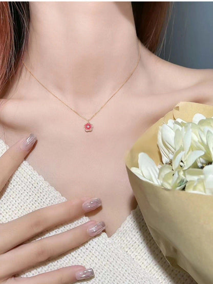 Collier avec pendentif en fleur de cerisier rose charmant et chic