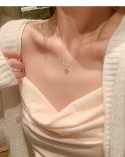 Collier avec pendentif en fleur de cerisier rose charmant et chic