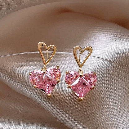 Ensemble collier et boucles d'oreilles pendantes en forme de cœur avec strass rose