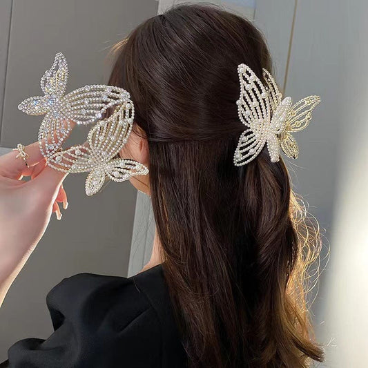 Pince à cheveux élégante en forme de papillon avec perles et strass