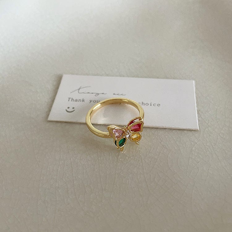 Eleganter offener Ring mit Schmetterlings-Emaille-Blumenperle