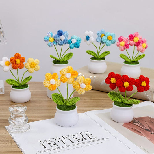 Fleur de marguerite en pot faite à la main au crochet