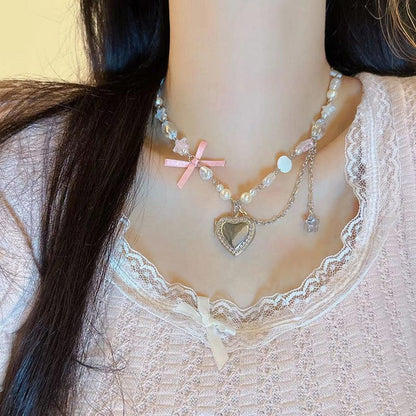 Collier ras du cou avec pendentif en forme de cœur et étoile en cristal