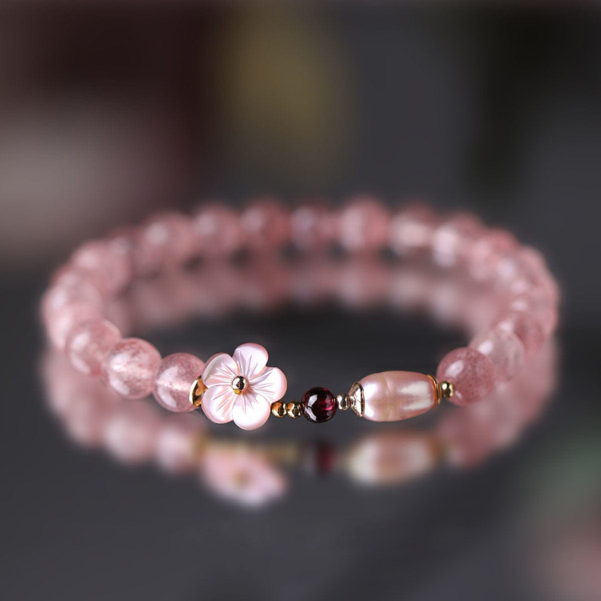 Bracelet en cristal rose doux avec fleur de cerisier