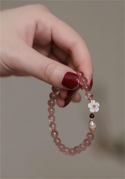 Bracelet en cristal rose doux avec fleur de cerisier