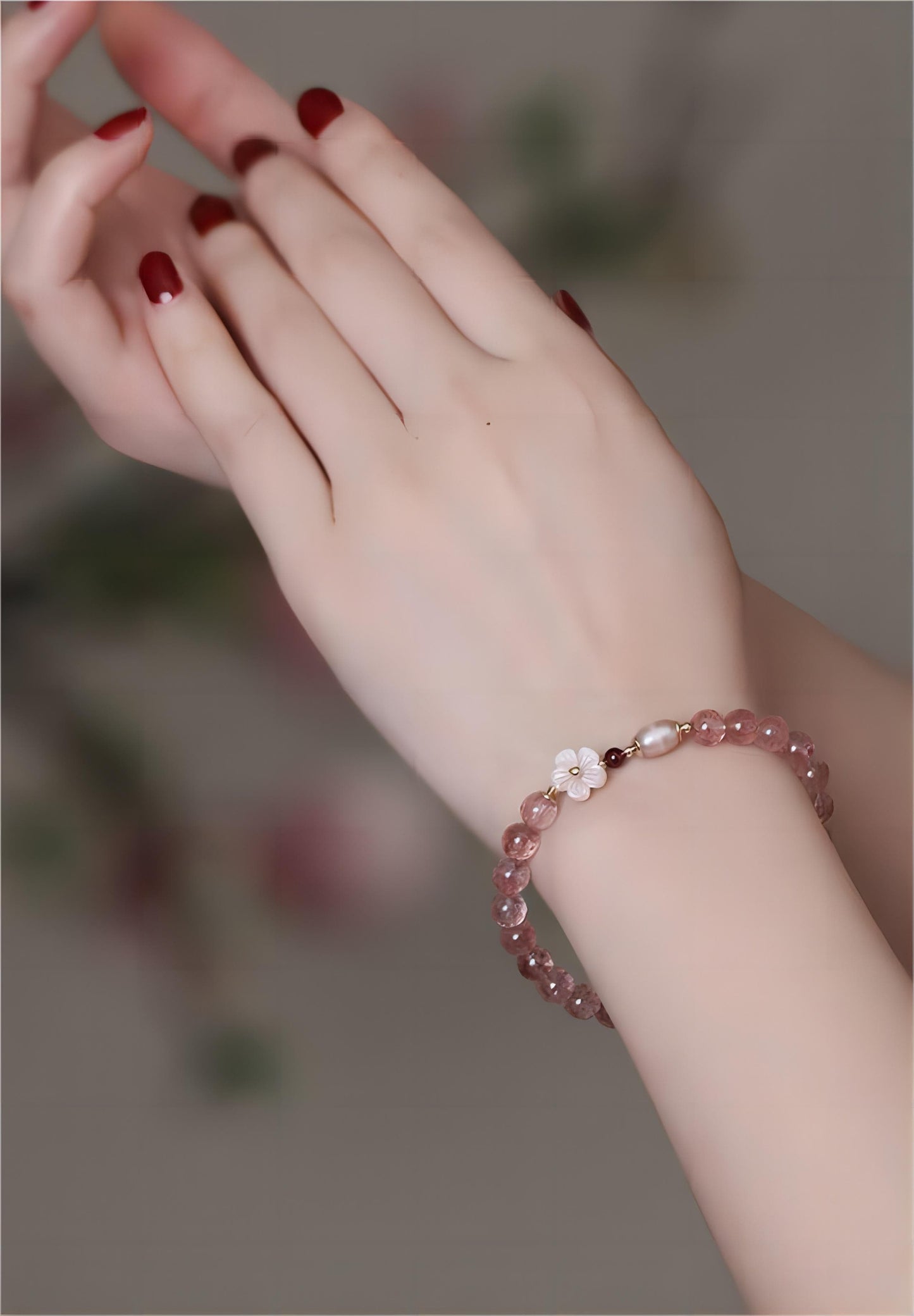 Bracelet en cristal rose doux avec fleur de cerisier