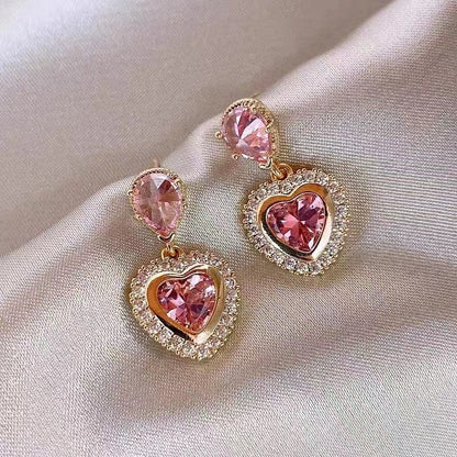 Boucles d'oreilles pendantes en forme de cœur rose élégantes