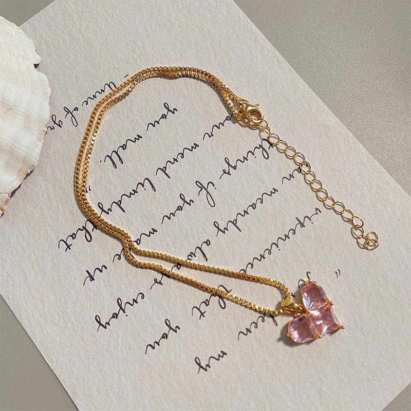 Ensemble collier et boucles d'oreilles avec pendentif en forme de cœur rose charmant