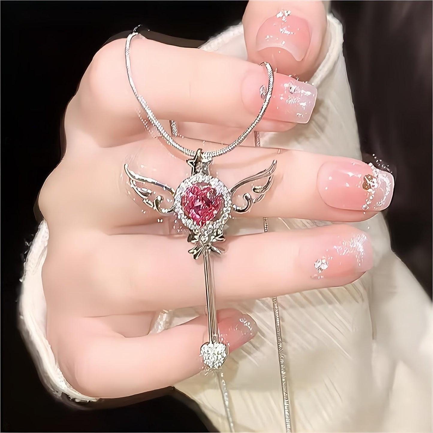 Collier baguette magique en forme de cœur rose doux